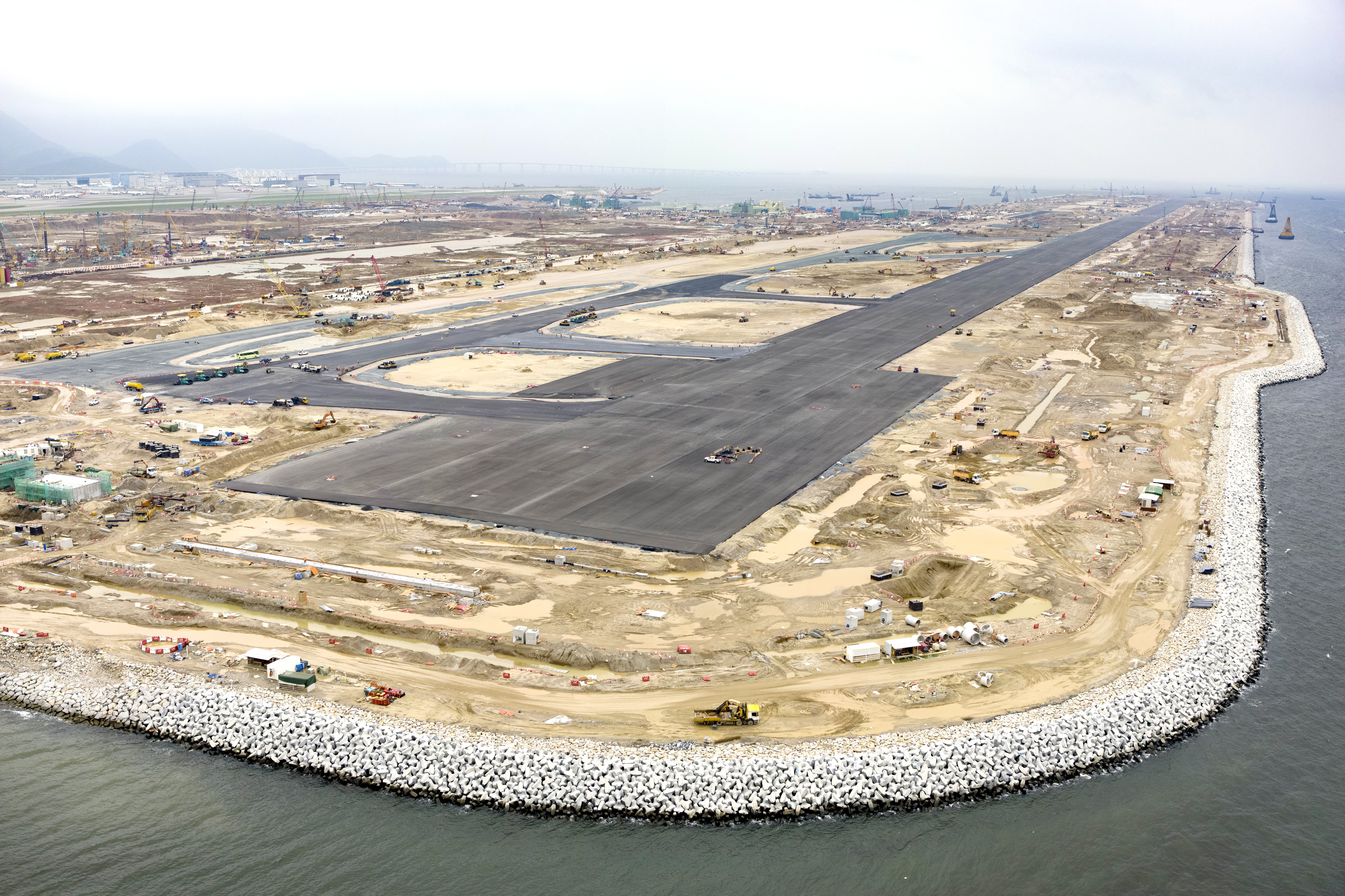 Pavement works of the Third Runway were completed in June 2021.