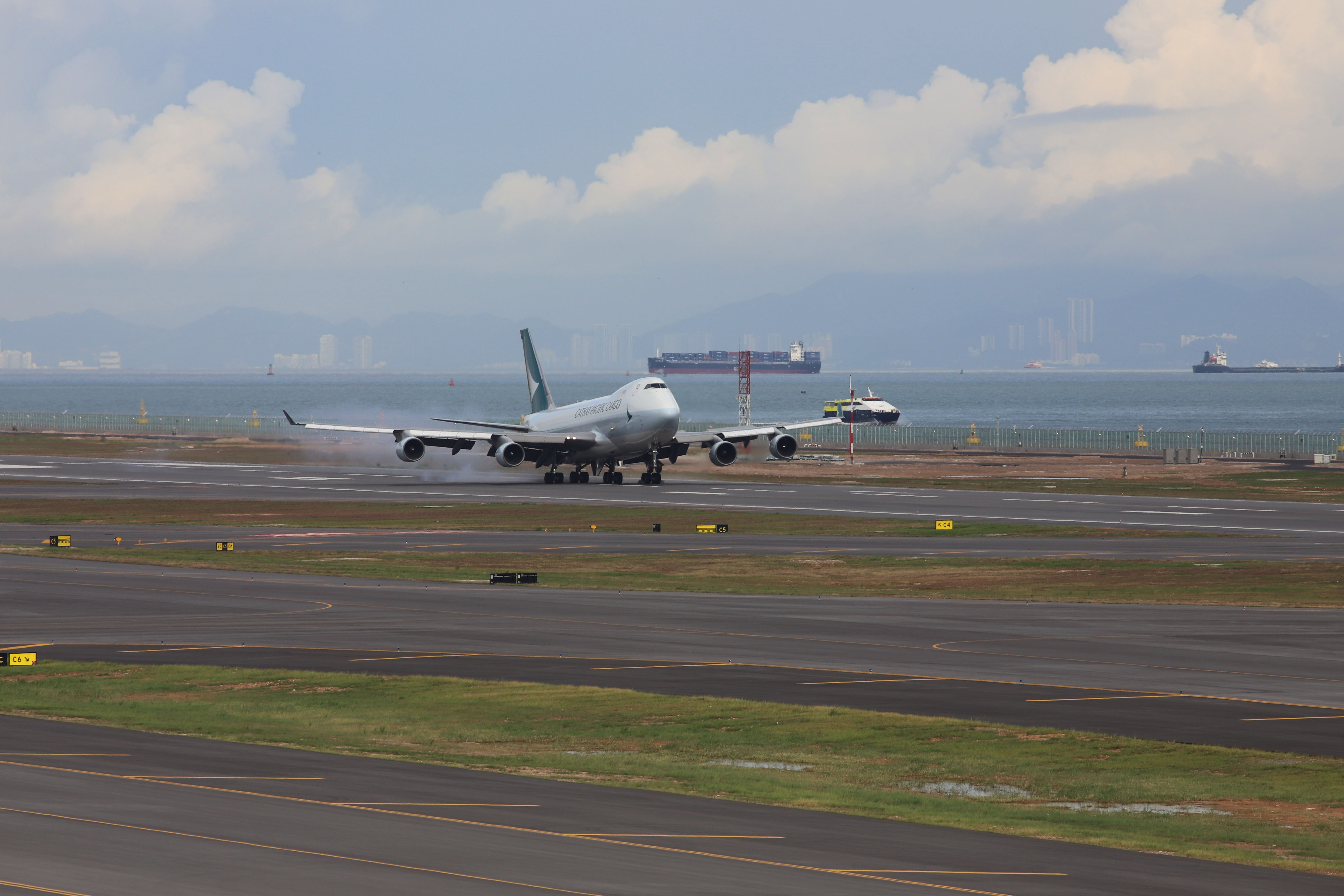 First commercial flight touches down on the Third Runway.